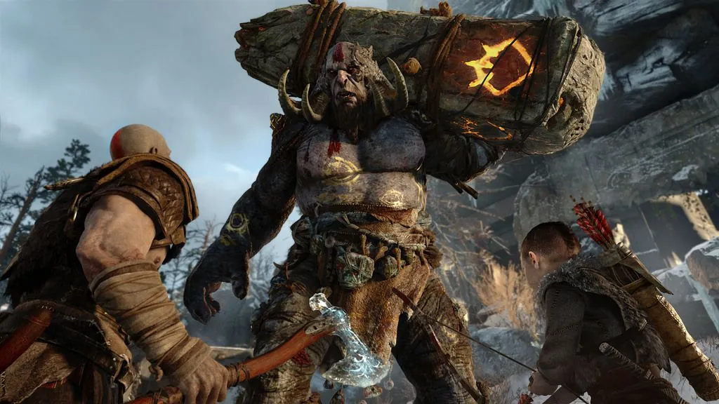 Kratos and Atreus facing a giant in God of War