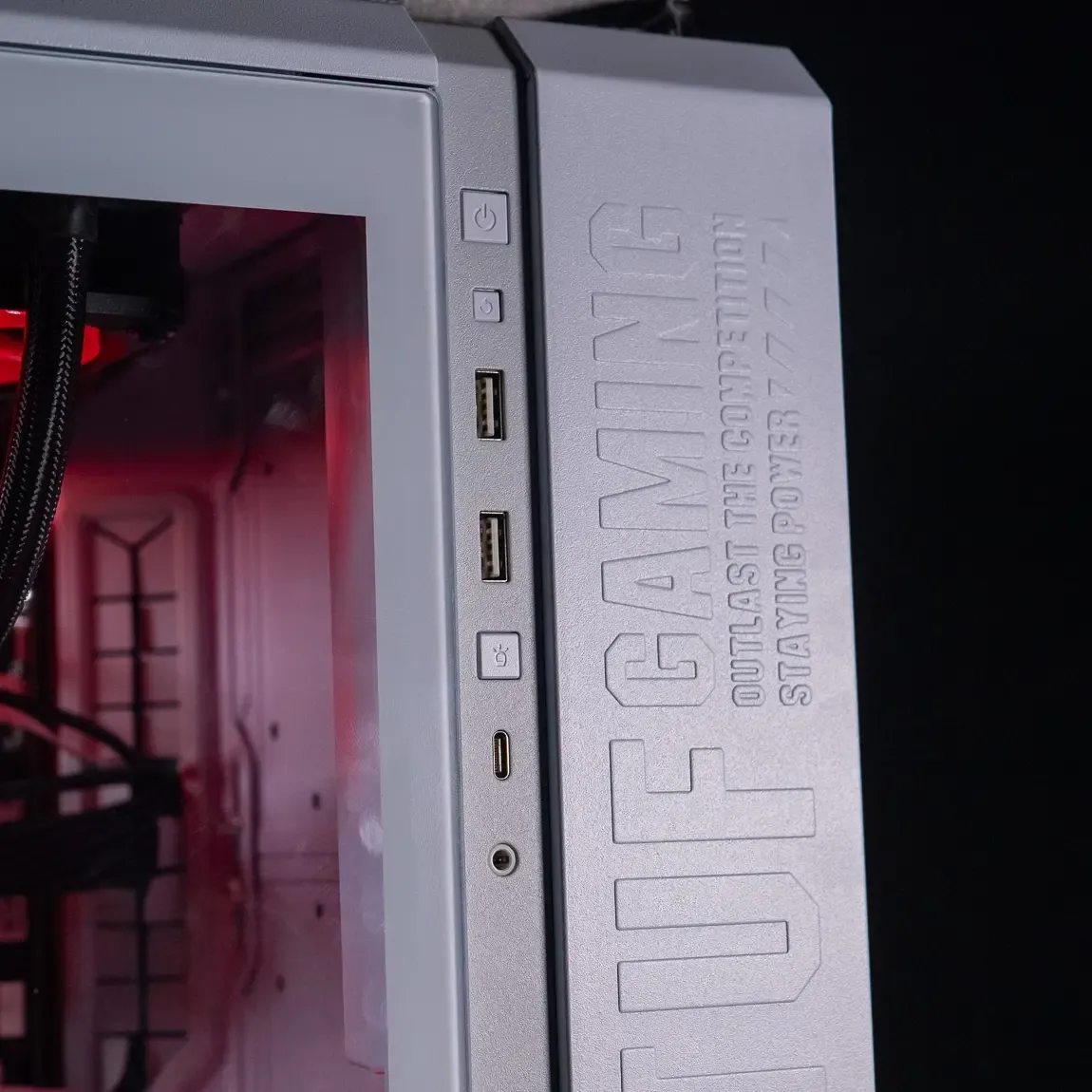 Front of a PC case with the power button and USB ports