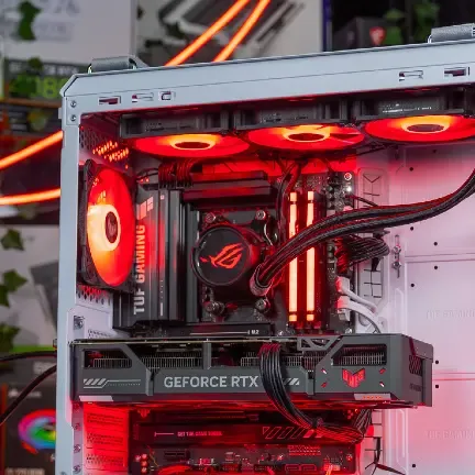 Inside a gaming PC with internal power cables, the water cooling, and the graphics card