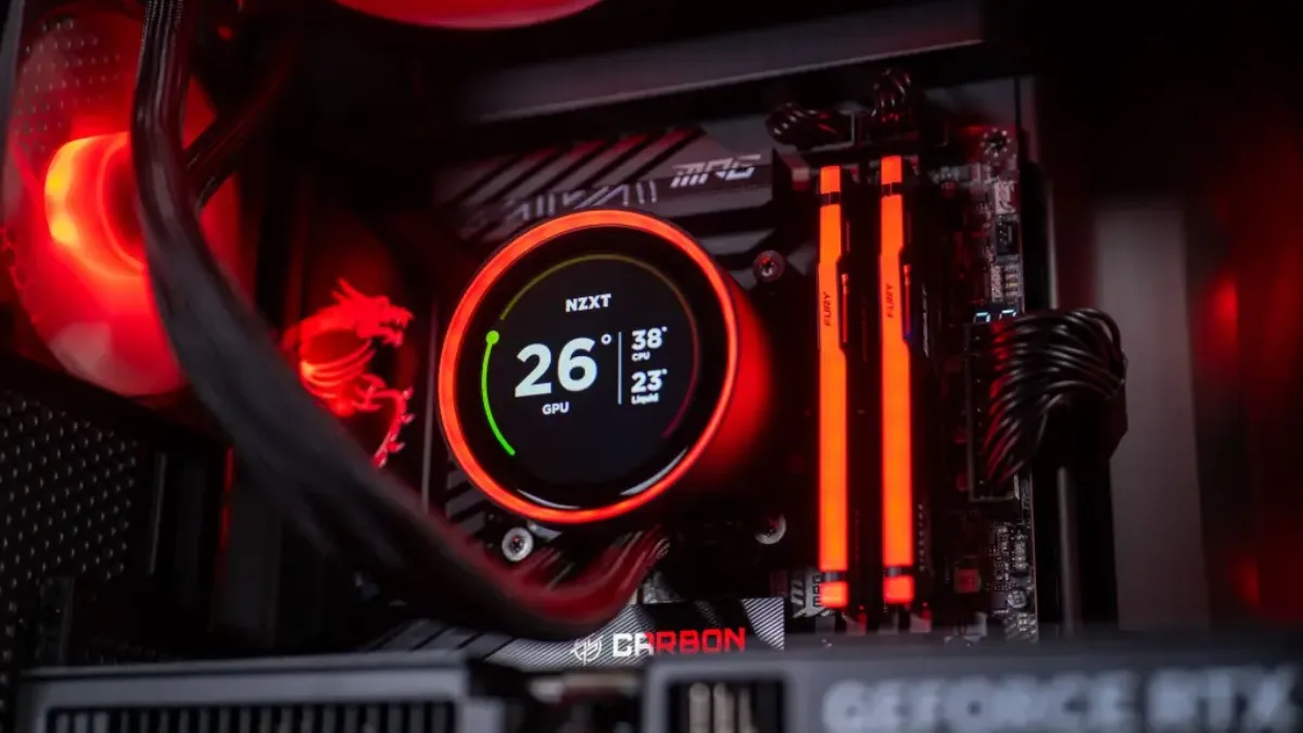 Inside a gaming PC with an illuminated RTX graphics card and watercooling