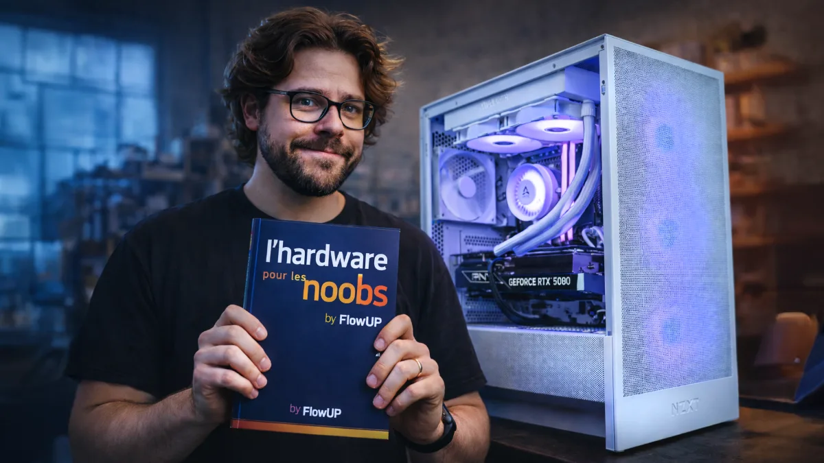 Een man die de FlowUP-gids “De hardware voor beginners” vasthoudt naast een witte gaming-pc