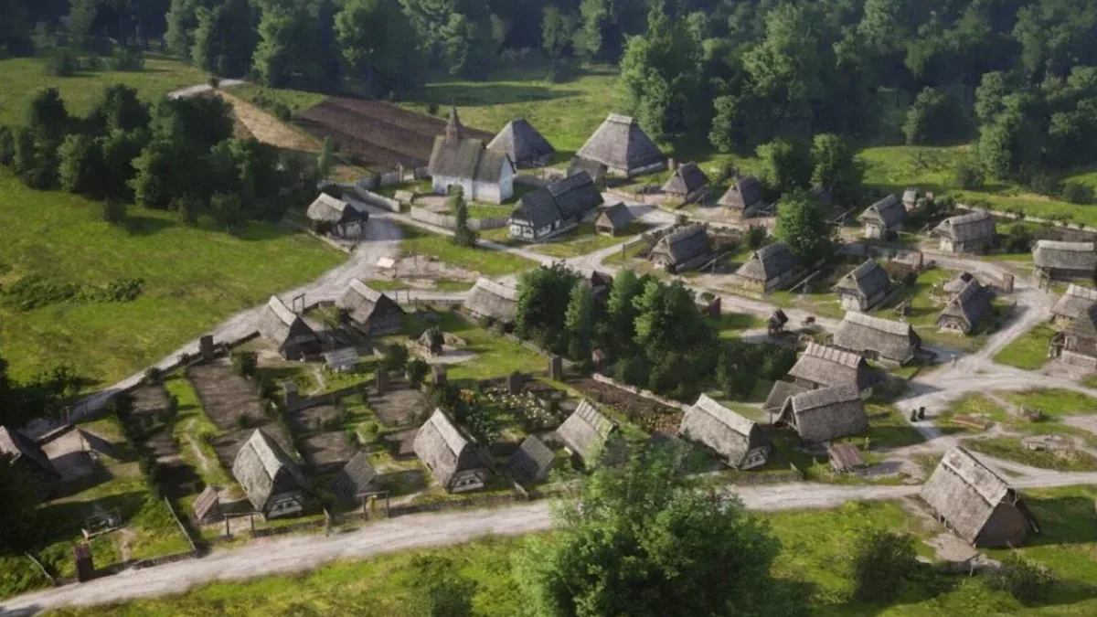 Aerial view of a medieval village in Manor Lords