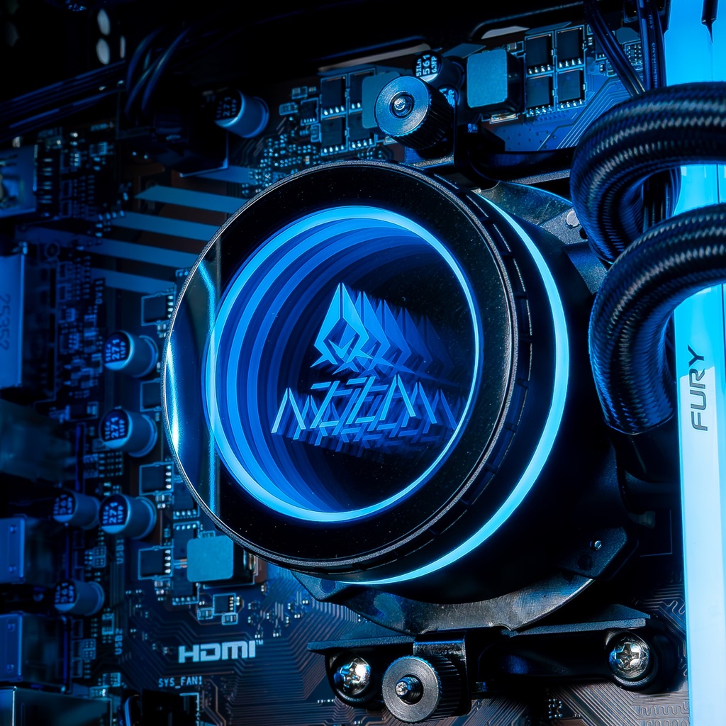 Gros plan sur le waterblock MSI MAG Coreliquid avec son logo dragon emblématique, installé au cœur du PC gamer Nightwing