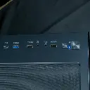 Vue de dessus du panneau de contrôle du PC Nightwing avec ports USB 3.0, ports USB 2.0, prises jack audio et boutons d'alimentation et de gestion LED